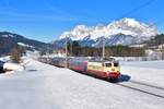 113 309 mit einem Turnuszug am 16.02.2019 bei Fieberbrunn.