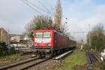 112 024-5 der WFL fährt mit einem Ersatzzug auf der Linie RB 46 in den Haltepunkt Bochum-West ein (26.02.2022)