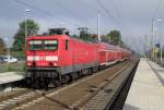 114 026-8 kommt hier mit dem RE2 von Berlin Hbf(tief) nach Cottbus durch Gro�beeren gefahren.
