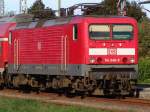 114 040-9 steht mit RE 38591 von Warnem�nde Richtung Berlin Hbf(tief)abgestellt im Bahnhof Warnem�nde.(17.10.10)