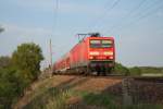 Am 29.04.2011 ist 114 027 mit ihrem RE 3 Richtung Berlin unterwegs , hier zwischen Eberswalde und Angerm�nde.