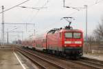 114 014 mit RE 5 am 13.02.2011 in L�wenberg (Mark)