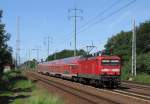 114 015-1 fuhr am 02.06.2011 durch Diedersdorf und brachte den RE3 nach W�nsdorf-Waldstadt.