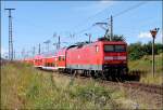 114 040-9 kommt mit dem RE38314 aus Falkenberg.
