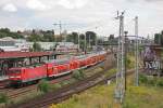 114 028 am 11.8.12 mit ihrem RE in Berlin Warschauer Stra�e.