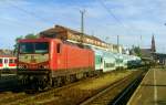 114 021 mit SE 33180 (Schwerin–Wismar) am 03.06.2000 in Schwerin Hbf