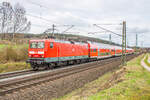 114 009-4 als RB in Richtung Frankfurt/M. am 22.03.2023 bei Kerzell.