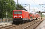 114 023 zieht den RE1 von Rostock nach Hamburg. Hier bei der Einfahrt in den Bf. Pritzier. 05.07.2007