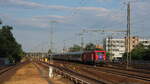 114 006 der WFl zieht den D 300 (Nachtzug Berlin-Stockholm) kurz nach der Abfahrt von B-Gesundbrunnen durch Stresow, hier schon mit ca.