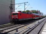 BR114 011-0 zieht hier ihren RE der Linie 1 in Richtung Eisenhttenstadt am S-Bahnhof Savignyplatz (Berlin) vorbei. (29.05.04)