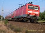 114 101 legt mit ihrer RB nach Leipzig Hbf bei Muldenstein in die Kurve.