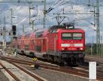 In den Berliner Hbf(tief) fhrt jetzt 114 010-2 mit seinem RE5 (RE 33107) ein.