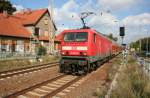 DB 114 027-6 mir RE3 nach Stralsund am 28.09.2008 bei der Durchfahrt in Rdnitz.