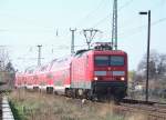 114 013-6 kommt hier mit der RB14 gleich in den Lbbenauer Bahnhof reingefahren. 03.04.2009