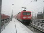 Hier 114 002-9 mit einem RE3 von Wnsdorf-Waldstadt nach Stralsund Hbf., bei der Ausfahrt am 17.12.2009 aus Angermnde.