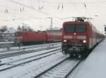 Hier 114 012-8 mit einem RE3 von Wnsdorf-Waldstadt nach Stralsund und im Hintergrund 112 123 mit einem RE3 von Schwedt/Oder Hbf.