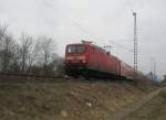 Hier 114 038-3 mit einem RE3 von Elsterwerda nach Schwedt/Oder Hbf., am 23.3.2010 zwischen Schwedt/Oder Mitte und Schwedt/Oder Hbf.