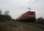 Hier 114 038-3 mit einem RE3 von Schwedt/Oder Hbf. nach Elsterwedra, am 23.3.2010 zwischen Schwedt/Oder Hbf. und Schwedt/Oder Mitte.