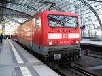 Die 114 037-5 schiebt den RE 38084 der Abendsonne entgegen nach Brandenburg Hbf, hier in Berlin Hbf am 02.04.2010.