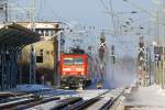 Am 4.12.2010 erreicht 114 024-3 mit ihrem RE nach Elsterwerda den Bahnhof Doberlug-Kirchhain. Die Signale fr das neue ESTW-A stehen bereits, doch noch werden im Stellwerk W-2 die Weichen gestellt.