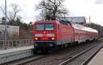 Der Exot 114 101 bespannte am 06.03.11 eine RB nach Wittenberg, hier beim Halt in Burgkemnitz.