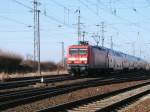 114 007 hat mit dem RE 18315 nach Elsterwerda den Stralsunder Hbf am 22.Mrz 2011 verlassen.Am Abzw Stralsund Rgendamm fotografierte ich den Zug.