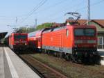 114 008 links,mit dem RE Lutherstadt Wittenberg-Rostock,traf am 23.April 2011 in Neustrelitz,auf den Gegenzug,aus Rostock nach Lutherstadt Wittenberg,geschoben von 114 038.