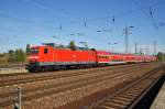 Hier 114 031 mit einem RE7 (RE18254) von Berlin Zoologischer Garten nach Wünsdorf-Waldstadt, bei der Einfahrt am 3.10.2012 in Berlin Schönefeld Flughafen. 