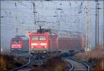 114 019-3 (schiebt RE38346 aus Elsterwerda) im Morgennebel. (Stralsund am 19.11.06)