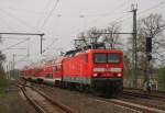 114 016 mit RE 18019 (Berlin Gesundbrunnen–Cottbus) am 11.04.2011 in Luckau-Uckro (aufgenommen vom Bahnsteigende)