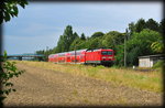 114 032-6 mit dem RE 17686 von Leipzig Hbf nach Magdeburg Hbf, in Zschortau am 21.07.2016.