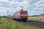 114 014-4 am 21.07.2021 bei Kerzell in Richtung Fulda unterwegs.