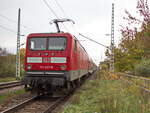 Nachschuß auf 114 027-6 als RE 5 nach Wünsdorf Waldstadt am 23. Oktober 2022 in Dabendorf.