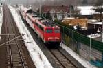 115 509 zieht am 18.02.10den PbZ 1966 durch Holzweissig Richtung Bitterfeld, wo ihm anschlieend noch 181 204 und zwei 112er angehangen worden.