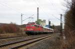 Der samstgliche 1953 bestehend aus 115 448, 110 243 einem IC- und drei Autozugwagen am 27.2.10. in Hannover Misburg.