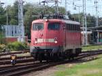 115 346-9 kurz nach der Ankunft aus Stralsund,hier war sie gerade am Rangieren im Rostocker Hbf.(03.09.10)  