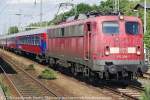 E-Lok 115 205-7 (9180 6 115 205-7D-DB)der DB AutoZug GmbH Berlin vor dem Sonderzug Bahn Touristik Express  Holland America Line  nach Warnemnde im Bahnhof Berlin-Wannsee wartend.