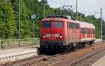 115 205 fuhr am 16.06.11 mit dem sagenhaft langen PbZ 2467 durch Burgkemnitz Richtung Bitterfeld.