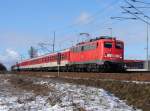 115 205-7 vor dem NZ1449 aus Hagen. Der Zug durchfhrt gerade den Haltepunkt Stralsund - Grnhufe. (am  26.02.06) 