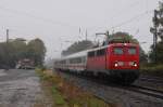 115 278-4 durchfhrt am 03.10.2012 bei strmenden Regen mit Pbz 2451 von Hamburg-Langenfelde nach Dortmund Bbf den Bahnhof Mersch (Westf.) gen Hamm.