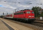 115 383-2 mit einem kuren Pbz aus Richtung München Hbf kommend. Aufgenommen in München Heimeranplatz am 07.10.2014.