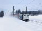 Die 139 133 mit einem Turnuszug am 11.02.2012 unterwegs bei Fieberbrunn.