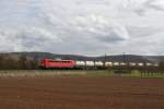 139 313 mit einem Gterzug am 31.03.2010 bei Thngersheim im Maintal.