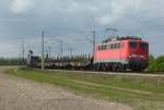 139 554-0 ist mit einen gemischten Gterzug am 18.04.2012 bei Waghusel