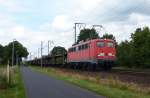 Die 139 285-1 der EGP fuhr am 19.06.2012 mit einem leeren Autozug von Emden gen Osten, hier in Leer.