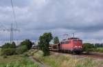 Die 139 314-9 fuhr am 17.07.2012 mit einem Gterzug von Emden nach Osnabrck, hier sdlich von Leer.