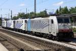 Die 139 260-4 mit der 139 133-3 + 139 555-7 und 186 102-0 der Lokomotion mit dem planmigen Lokzug nach Nrnberg durch Mnchen Heimeranplatz am 08.07.2012