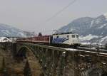 139 213 mit der Leerfahrt des Schneeexpresses von Schwarzach-St. Veit nach Mallnitz am 23.02.2013 auf der Angertalbrcke bei Angertal.