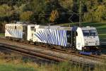 Die 185 661-5 mit 139 310-7 stehen als Lokzug von Nürnberg nach München kurz vor Donauwörth in der Überholung am 02.10.2012