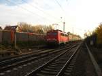 140 446-6 mit einem Containertzug am Haltepunkz Karlsruhe Hagsfeld 29.10.07